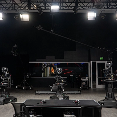 Multi-camera pedestal floor on a darkened stage